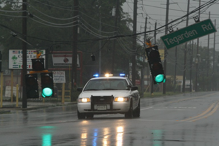 A police cruiser prowls the streets of Gulfport. August 29, 2012.