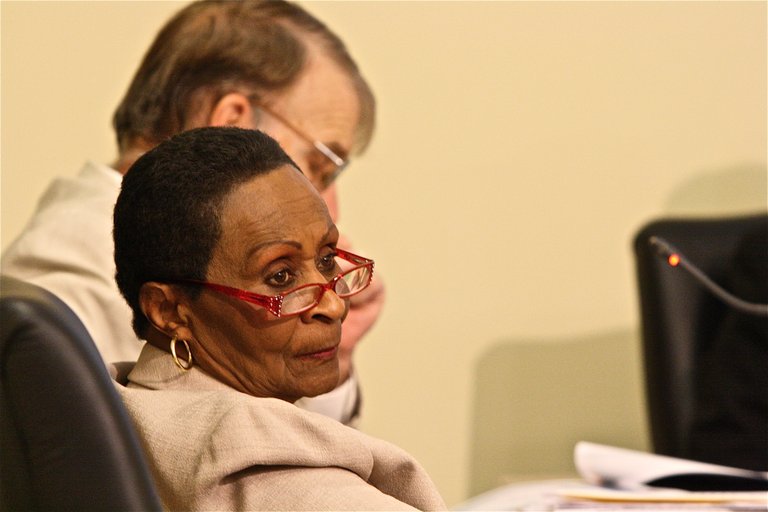 JPS board member Kisiah Nolan listens to a Jackson resident during the Board’s public hearing on the school budget Tuesday.