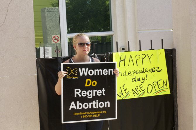 July 2, 2012: Outside the Jackson Women's Health Organization, protester Ashley Sigrest talked about her own abortion and how she now counsels other women who have gotten and regretted their abortions.