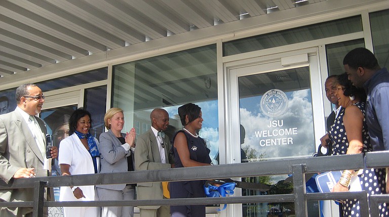 JSU and city leaders open the doors to JSU's new Welcome Center. From left: David Hoard (vice president of institutional advancement), Gwen Caples (director of JSU Welcome Center), Marika Cackett (public relation manager of Jackson Convention and Visitors Bureau), state Sen. Hillman Frazier, Sarah Brown (Miss Jackson State University) and Carolyn W. Meyers (president of Jackson State University)