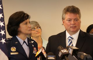Mississippi Air Guard commander Major General Catherine S. Lutz and, left, and Mississippi Center for Justice advocacy director Beth Orlansky, center, say a new state program will benefit people hurt in the foreclosure crisis.