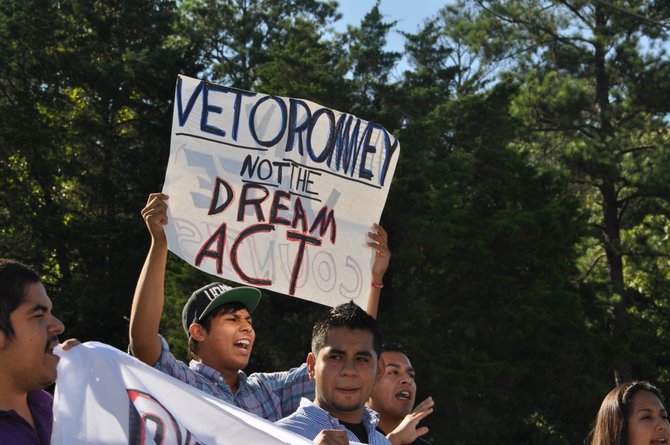 Protesters across the street from River Hills where Romney was holding a fundraiser. July 12, 2012.