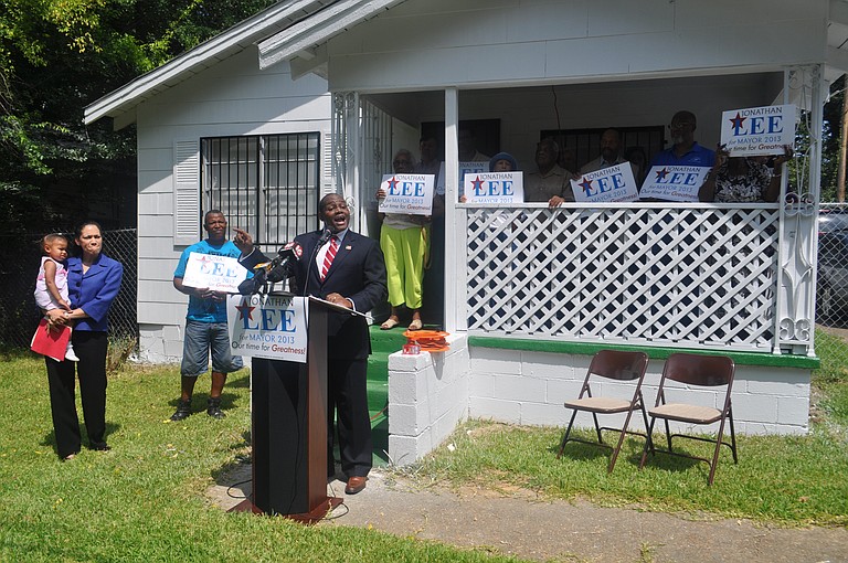 In front of his grandmother's former home in the Georgetown neighborhood, mayoral candidate Jonathan Lee unleashed his new campaign slogan: "Our Time for Greatness."