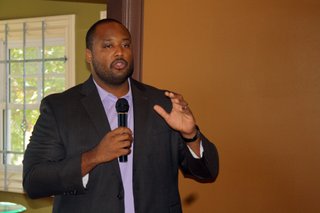 Corey Wiggins, project manager for MHAP, talked to citizens at Koinonia Coffee House Friday about the aspects of the Affordable Care Act that will soon take effect.