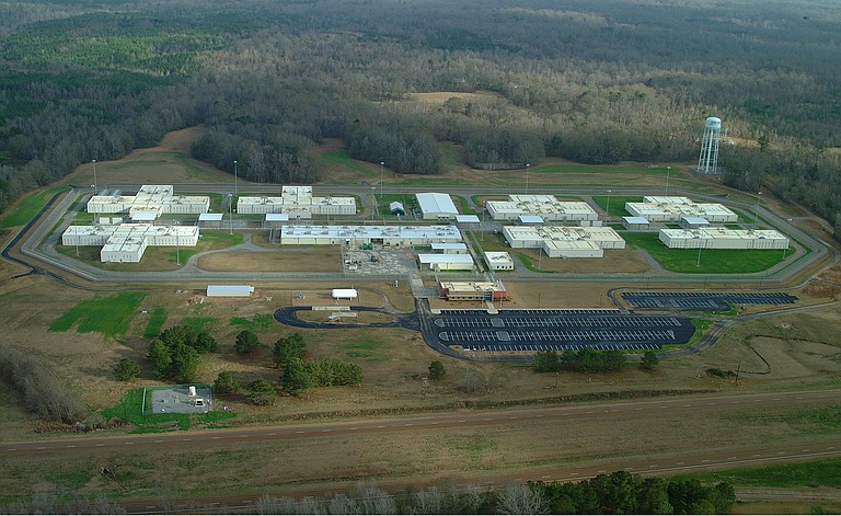 A Federal Bureau of Investigations report about the cause of a May riot at a privately run federal prison in Natchez refutes initial reports that a gang fight sparked the melee.