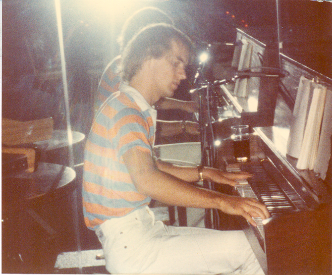 Hunter Gibson plays the piano and sings at  his very first concert in 1982.
