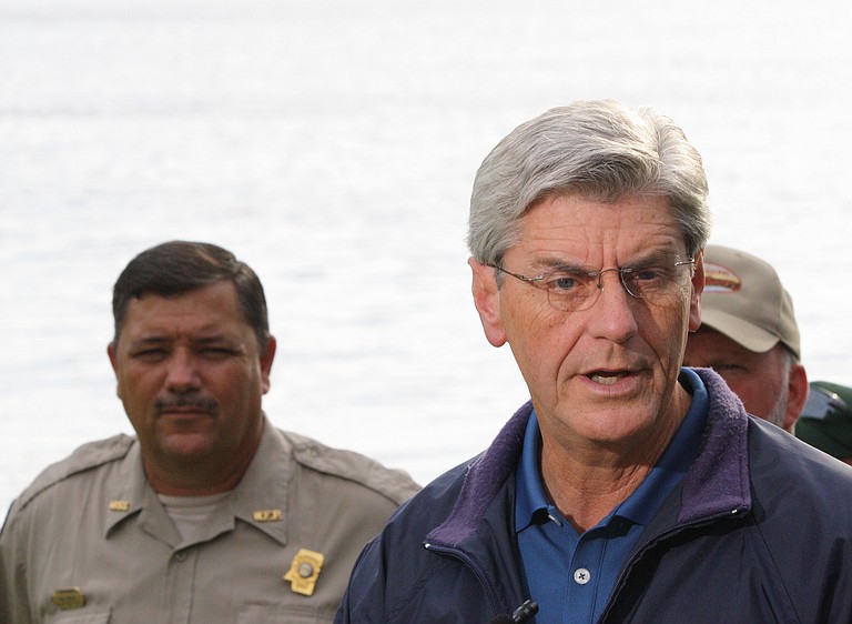 Gov. Phil Bryant toured the dam at Lake Tangipahoa Thursday with engineers and officials from several state departments.