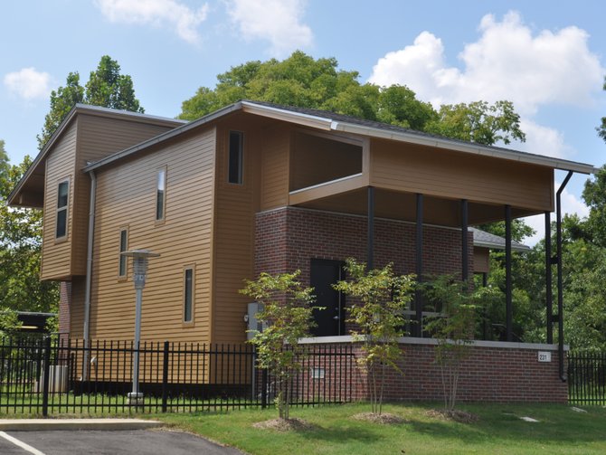 Residents will soon move into 16 new energy-efficient, affordable housing units in Midtown, complete with solar panel roofs on covered car ports.