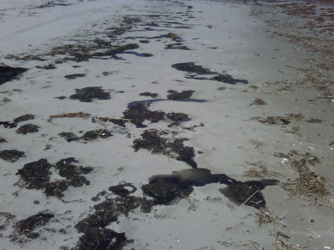 Hurricane Isaac disturbed oil from the 2010 BP disaster, washed up on Gulf beaches.