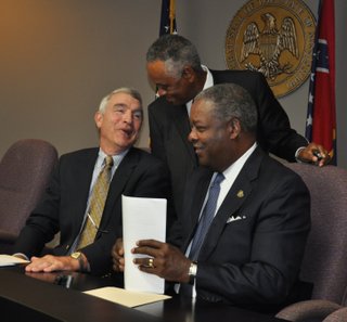 Levee Board members Flowood Mayor Gary Rhoads, developer Socrates Garrett and Jackson Mayor Harvey Johnson Jr. are all singing the same tune, in support of a "One Lake" flood-control plan.