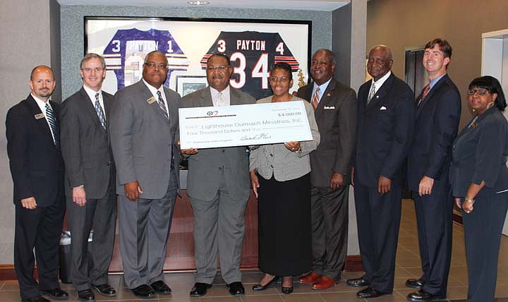 BankPlus and Federal Home Loan Bank of Dallas presented two Jackson organizations with $4,000 grants.