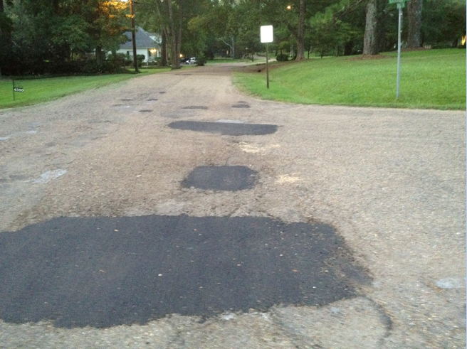 Scene of the crime: Note the patched areas where the potholes once stood.