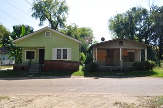 These side by side homes epitomize the challenges and struggles of the Washington Addition neighborhood.