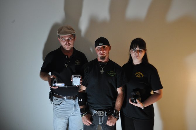 Co-founder and videographer Rob Hood, co-founder and lead investigator David Childers and investigator Kassie Kirby chase the mysteries and spirits of the South as members of the Delta Paranormal Project.