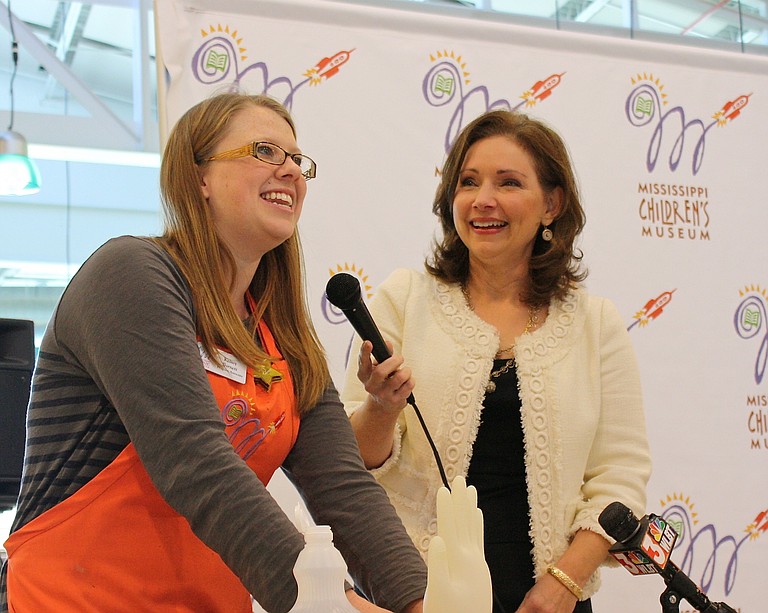 Kelsey Barnett, left, and Susan Garrard demonstrate one of the activities children will take part in at the Children's Museum's Question It? Discover It! Saturdays.