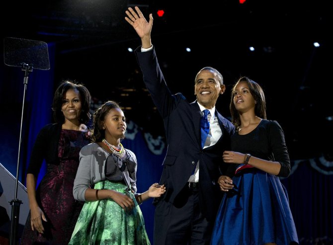 President Barack Obama was re-elected on November 6, 2012. Here he is surrounded by his family at his party in Chicago, IL.
