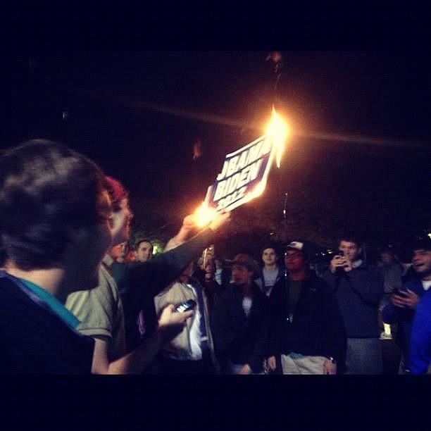 This photo of students at Ole Miss burning an Obama/Biden yard sign in protest of the president's re-election victory went viral Election night.