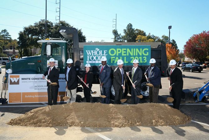 (From Left to Right:) WS Development Vice President Lou Masiello, Whole Foods Market South Region President Omar Gaye, City Councilwoman Margaret C. Barrett-Simon, Mayor Harvey Johnson Jr., Jackson city Councilman Quentin Whitwell, Highland Village General Manager Guy Boyll III, Jackson city site-plan review Coordinator Joseph Warnsley and city Director of Planning and development Bennie Hopkins break ground on the new Whole Foods Market at Highland Village Thursday.