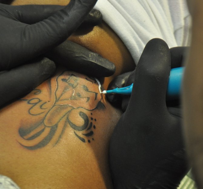 Jimmy Bogan started tattooing informally at age 19. Now he owns Jackson’s first African American-operated tattoo parlor.