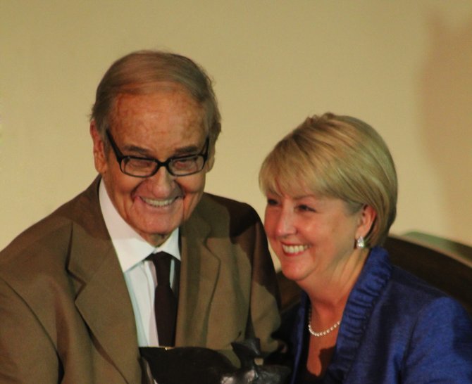 Above: Lee McCarty (left) is all smiles accepting the Governor’s Award from Deborah Bryant last February. 