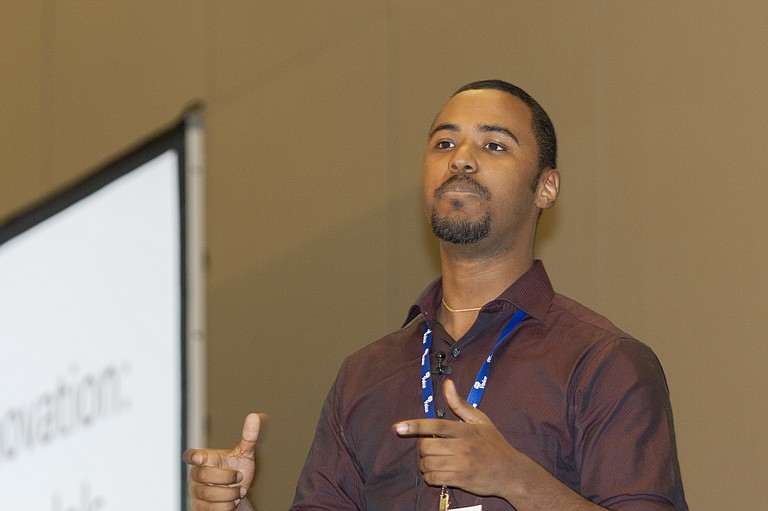 Yorman Nunez, field organizer for the Massachusetts Institute of Technology's Community Innovators Lab, told local black leaders about the fight to bring New York City's poorest zip code out of poverty.
