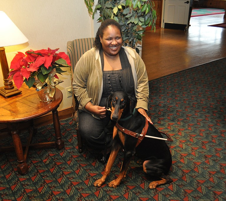 Zoey with her owner, Consuelo Johnson
