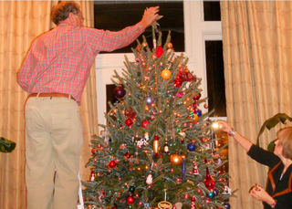 Over the past few years, helping decorate Mike McRee’s Christmas tree has become an annual event for my downtown family.