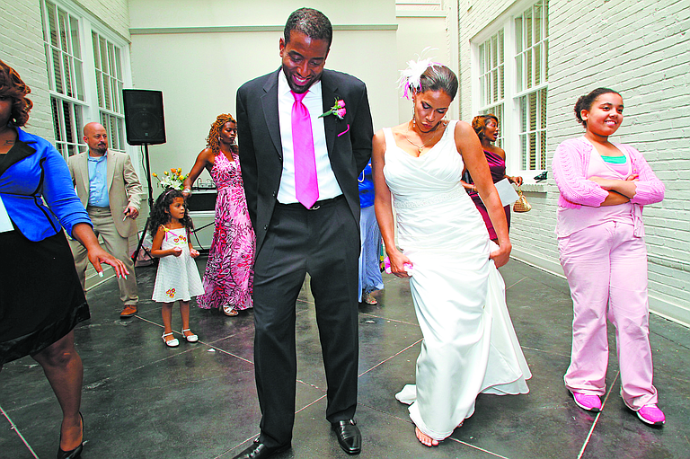 The wedding of Wendy Shenefelt and Michael Fleming paid homage to their passion for education and their heritage.
