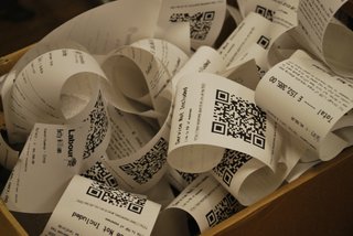 Just like the controversial compound it's designed to replace, a chemical used in cash register receipts and other consumer products messes with hormones, according to research published today.