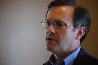 Forest Thigpen believes charter schools would create competition that would force traditional public schools to perform better.
