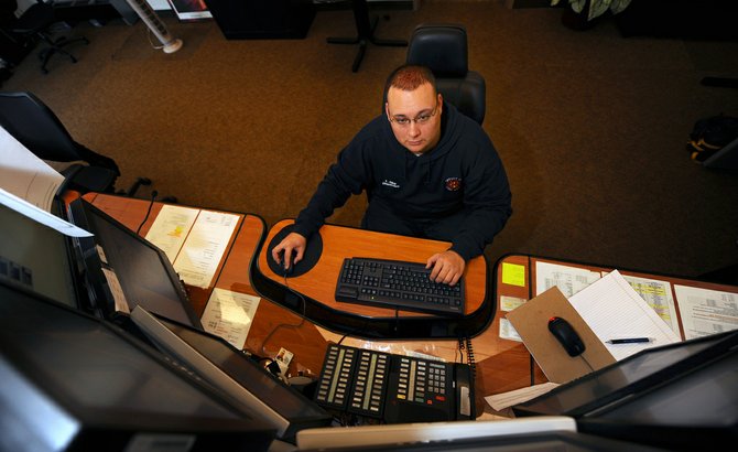 Mark Young (not pictured), director of the county Officer of Emergency Management, said the county's E-911 fund, which pays for the equipment and personnel related to 911, is going broke.