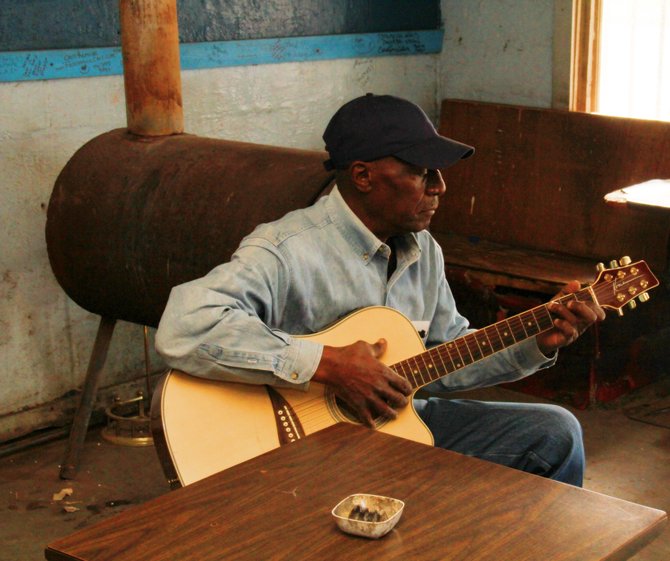 Bluesmen such as Jimmy Holmes dot the trail, keeping the music of their fathers and grandfathers alive.