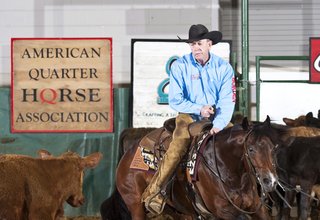 A good cutting horse gets down to a cow’s eye level to keep it from the herd.