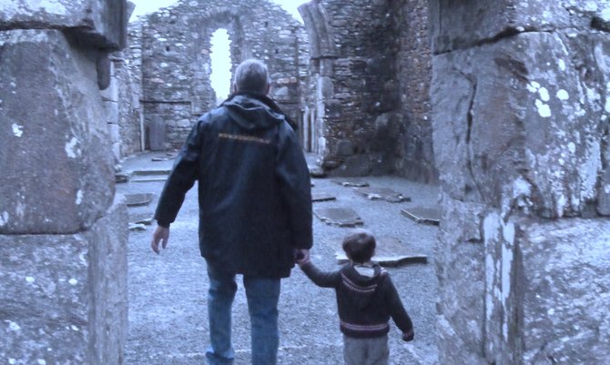Ireland is a place for educational exploration. Here, the writer’s son explores an ancient monastery in the valley of Glendalough with a Wild Wicklow Tours guide.