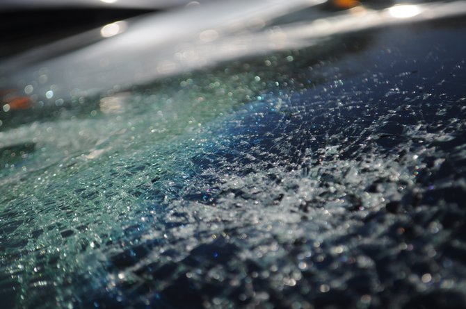 Hail-damaged vehicles dot the lot at Smith Bros. Body Shop off Farish Street in Jackson after last Monday's hailstorm.