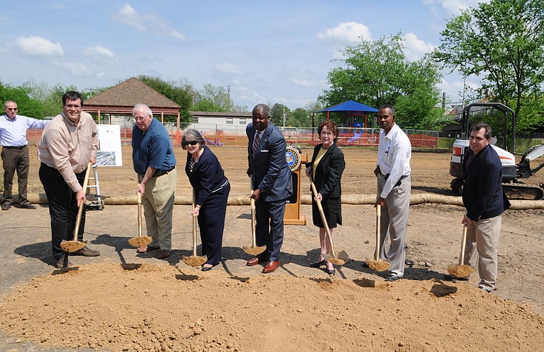 Mayor Harvey Johnson Jr. and representatives of the City Council, Southern Consultants and Caldwell Tanks break ground on the new 1.5 million-gallon water tank Wednesday.