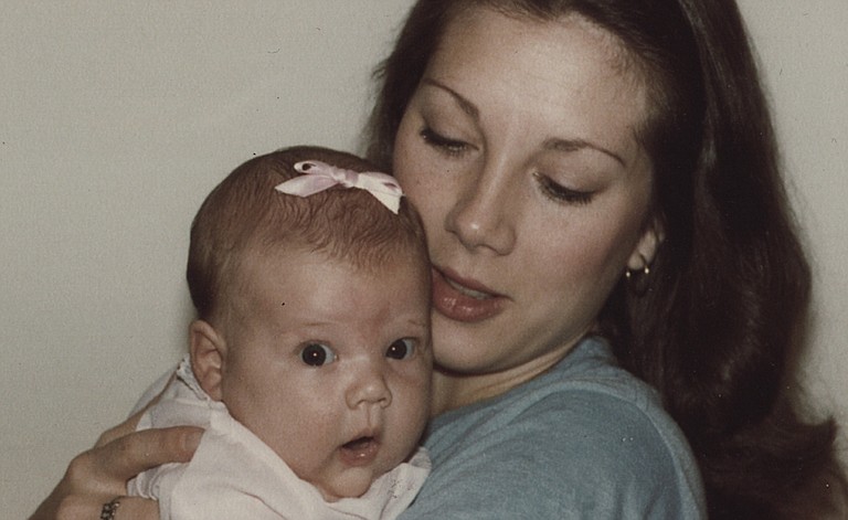 Ginger Williams-Cook, shown as a baby with her mom, embraced motherhood.