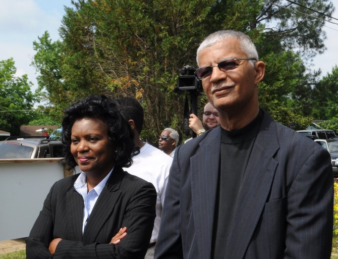 With just two days remaining before Jackson voters return to the polls to pick the city's next mayor, businessman Jonathan Lee's campaign is attempting to define rival Councilman Chokwe Lumumba (right) as a non-Christian, anti-American police-hater. Former mayoral candidate Regina Quinn (left) endorsed Lumumba.