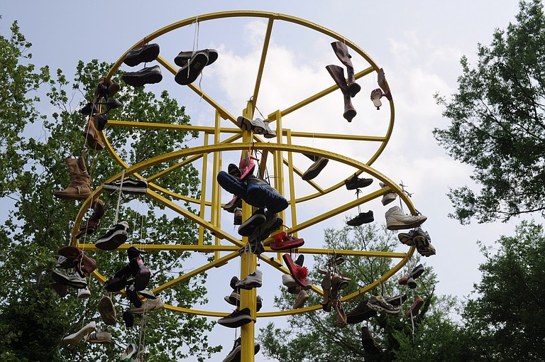 The shoes hanging from this structure were typical of the "decorations" for FIGMENT 2013, a festival designed to show off the creativity of the Midtown Arts Districts professional artists and bring out the artistic side in festival-goers.