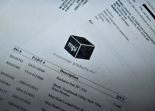 Jonathan Lee says his family's company is on the hook for $200,000 because it got caught in the middle of a contract dispute between one of the state's largest hospitals and a national contract purchaser.