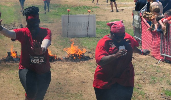 Paul Lacoste's training camp gave ShaWanda Jacome, right, the confidence to run in this year's Warrior Dash.