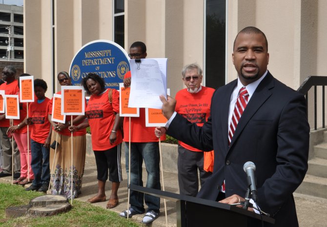Mississippi SPLC managing attorney Jody Owens (far right) spoke at a press conference in front of MDOC headquarters this morning.