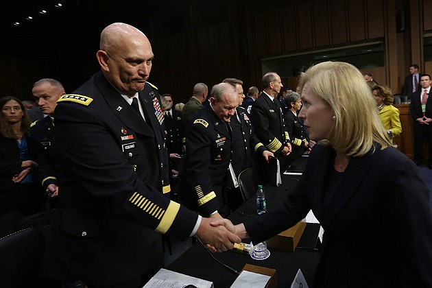 Sen. Kirsten Gillibrand (D-NY) shakes hands with Army Chief of Staff Gen. Raymond Odierno following the Senate Armed Services Committee hearing on sexual assaults in the military.