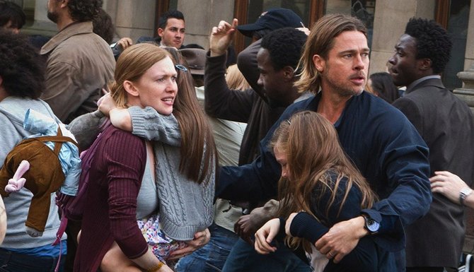 Brad Pitt fights to save his family from the zombie apocalypse in “World War Z.”