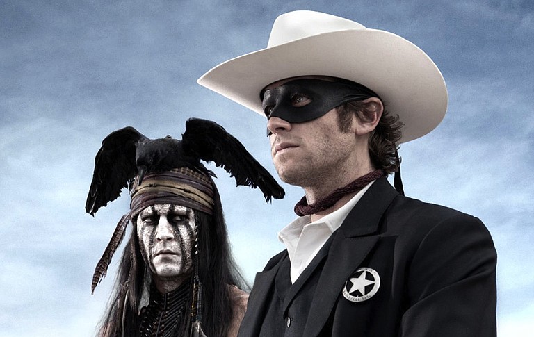 “The Lone Ranger” stars Johnny Depp (left) as Tonto and Armie Hammer as the masked man.