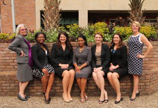 The 2013 Heroes of the Year are the members of the Women’s Initiative at Baker Donelson, including (from left) Sheryl Bey, Marlena Pickering, Ashley Tullos, Kenya Rachal, Alicia Hall, Anna Powers and Amy Champagne.