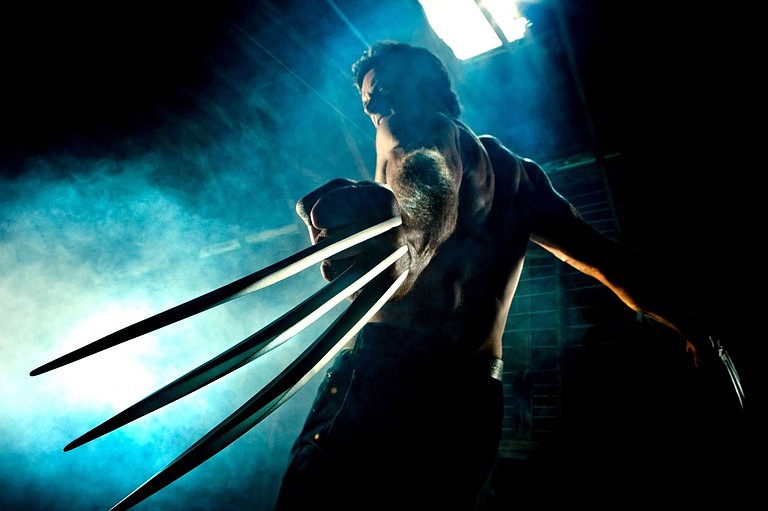 A buff and hairy Hugh Jackman wields his razor-sharp claws in “The Wolverine.”