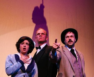 Beth Kander, Ray McFarland and John Howell star in “Sherlock Holmes and the Adventure of the Suicide Club” at New Stage Theatre.