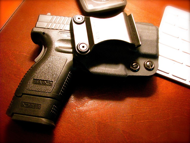 City Council President Charles Tillman has introduced a gun ordinance that would ban handguns from most public places.