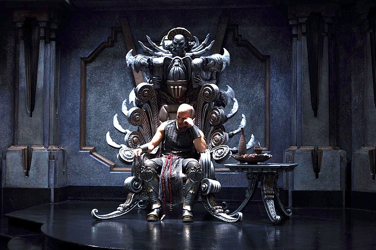 As the title character, Vin Diesel endures hell in “Riddick.”